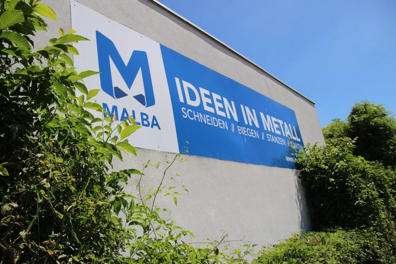 Malba Firmenschild – Ideen in Metall